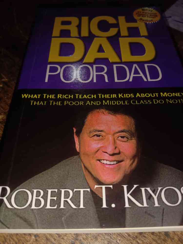Rich dad poor dad by Robert T kiyosakl image - Mobimarket