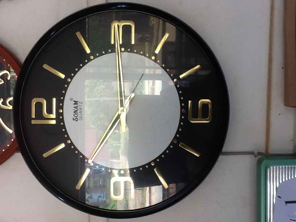 Sonam wall clock image - Mobimarket